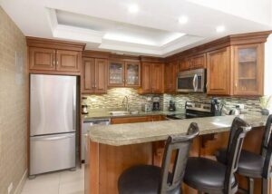 The kitchen of a Grand Cayman rental near some of the best restaurants.